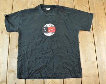 Vintage 1990s Nike Graphic T-Shirt / Swoosh / Nike Swoosh / Nike Vintage / Small Swoosh / Big Swoosh / Nike Check