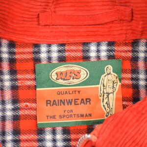 May include: Red corduroy jacket with a plaid lining and a label that reads "WFS Quality Rainwear for the Sportsman".