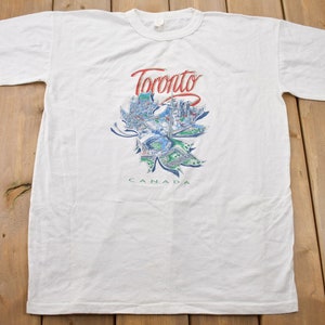 Camiseta vintage de 1999 con mapa de hojas de Toronto, Canadá, recuerdo, ropa de calle, camiseta vintage rara, camiseta de vacaciones, camiseta de viaje