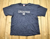 Vintage 1990s Champion Embroidered Graphic T-Shirt 90s Streetwear Vintage Athleisure Brand and Logo Vintage Champion