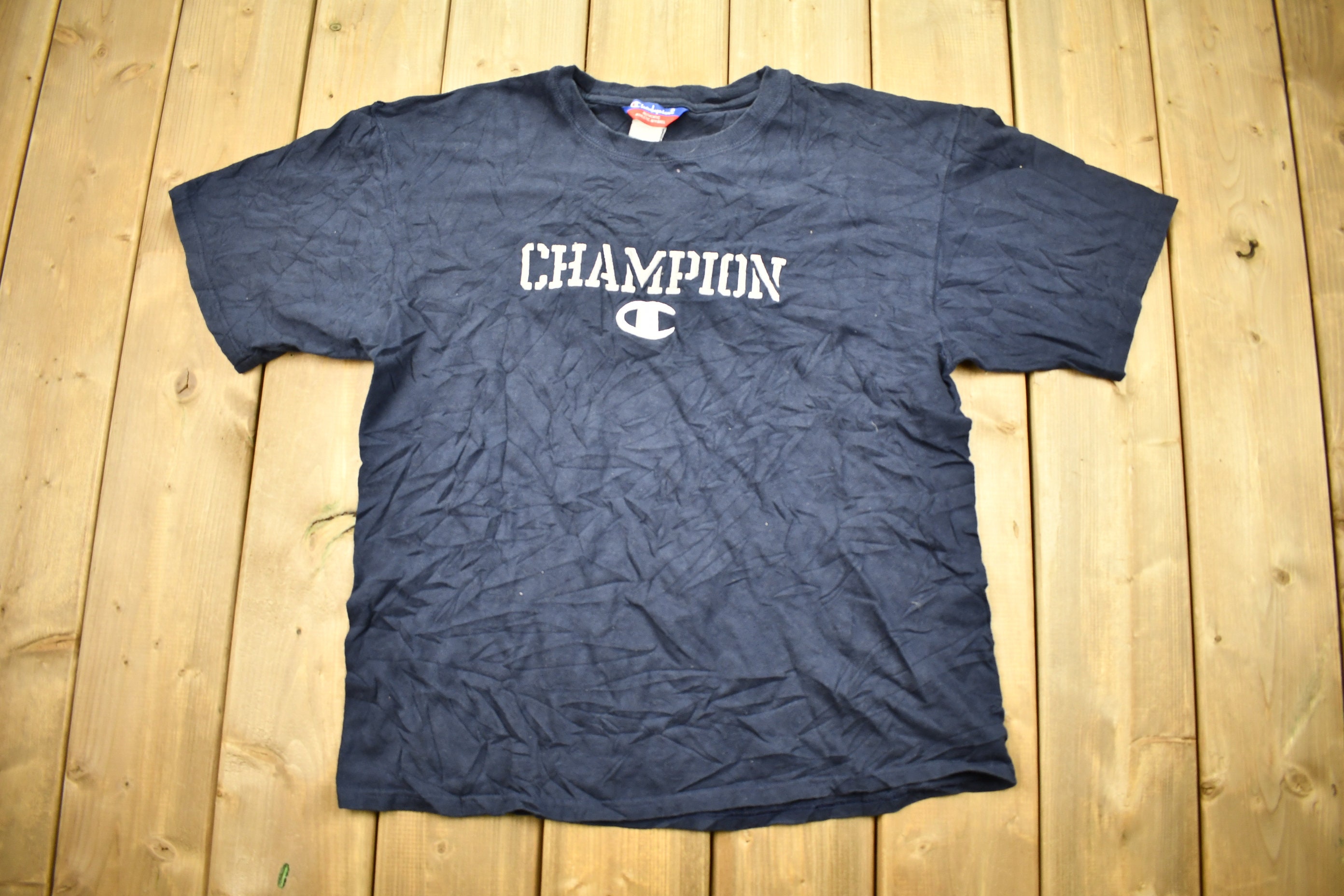 Vintage 1990s Champion Embroidered Graphic T-shirt Men's L / 90s