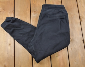 Vintage Y2K Nike Swoosh Black Dri-FIT Sweatpants Size M / Rare Nike Vintage / American Vintage / Streetwear Fashion / Athleisure