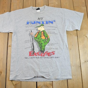 Vintage jaren 90 jachtexcuses cartoon souvenir T-shirt / vintage streetwear / vakantie-T-shirt / reis-T-shirt