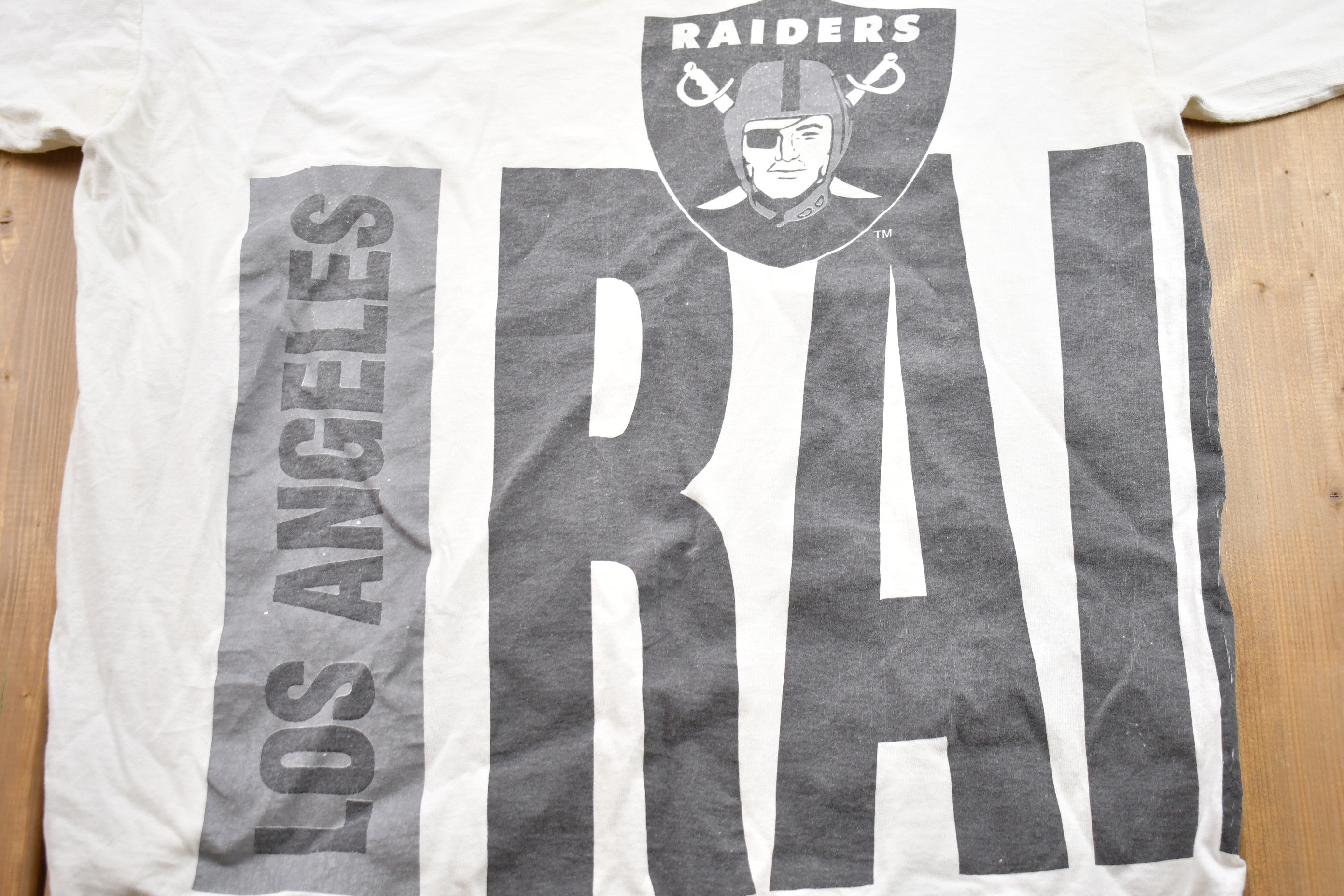 Vintage 1990s Starter Los Angeles Raiders NFL Graphic T-shirt