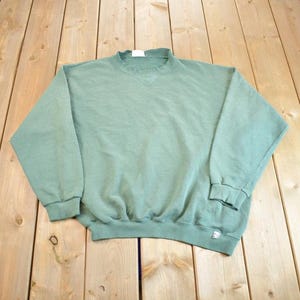 Vintage 1990s Discus Athletic Blank Green Distressed Crewneck Sweatshirt Made In USA