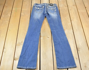 Miss Me? Cross Lace Embellished 2000's Low Rise Bootcut Jeans