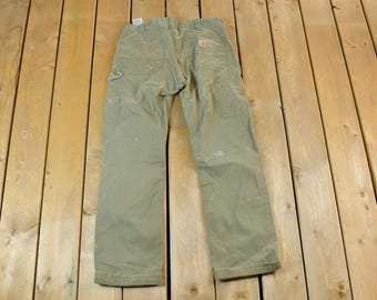 Vintage 1990s Carhartt Work Pants Size 32 x 32 / 90s Carpenter Pants / Made In USA / Distressed Carhartt / Vintage Workwear