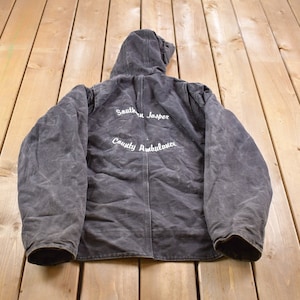 Vintage 1990s Carhartt Sherpa Lined Southern Jasper Country Ambulance Embroidered Sierra Sandstone Jacket / Workwear / Distressed Carhartt