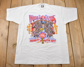 ヴィンテージ 1989 デトロイト ピストンズ NBA ワールドチャンピオン ビッグヘッド グラフィック Tシャツ / アメリカ製 / シングルステッチ / NBA バスケットボール / モーターシティ バッドボーイズ