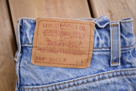 Vintage 1990s Levi's 550 Red Tab Jeans Size 26 x … - image 6