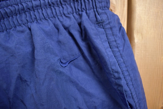 Vintage 1990s Blue Nike Mini Swoosh Windbreaker Pants Size XL