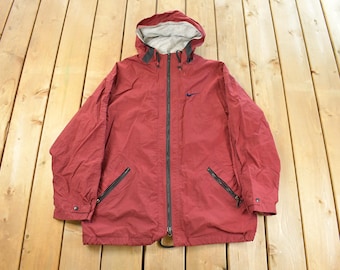 Vintage 1990s Nike Mini Swoosh Hooded Windbreaker Jacket Men's Large / Embroidered / 90s Streetwear / Nike Athletics