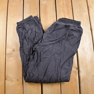 Vintage 1990s Nike Mini Swoosh Track Pants Size XL / Nike Jogger Pants / White Tag / Streetwear / 90s Track Pants / Trackpants