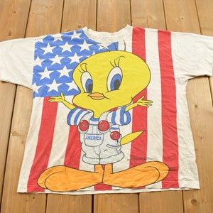 1995年ヴィンテージ トゥイーティーバード オールオーバープリント アメリカ国旗Tシャツ / ワーナーブラザーズ / カートゥーンネットワーク / アメリカ製 / ルーニー・テューンズ