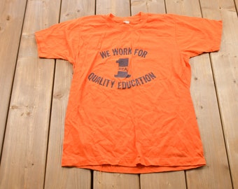 Vintage 1980s Quality Education Graphic T-Shirt / Graphic / 80s / 90s / Streetwear / Retro Style / Single Stitch / Made In USA