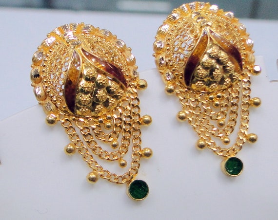 Mallika Thanga Maligai - Product Name: set gimiki Product Weight:6 grams  Today Gold Rate : 4,410.00 INR. Charming Traditional Mango Jimikki Earrings  are well-known marriage adornments in South India. This gold Jimikki