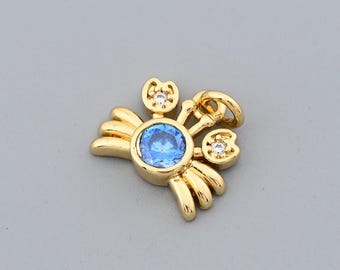 Elegante colgante de cangrejo oceánico relleno de oro de 18 quilates con gema central azul y garras de diamantes de imitación para joyería (11,3 x 10 mm)