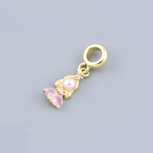 Eleganter goldener Tänzertropfen - leuchtendes Ornament, stilvoller Ballettakzent, einzigartiges kreatives Andenken, 17 x 8 mm