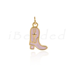 May include: Gold-tone charm in the shape of a pink cowboy boot with a star on the side.