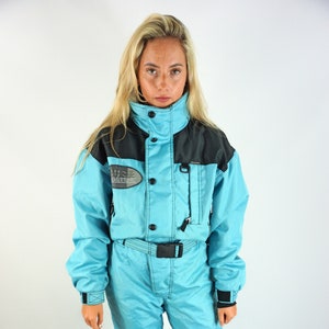 Spyder one piece ski suit womens 2025