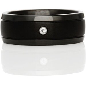 May include: A black tungsten carbide ring with a single diamond set in the center.
