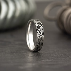 Anillo de plata de ley estilo acero de Damasco