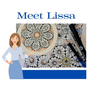 May include: A woman wearing a blue shirt and skirt smiles and points to a detailed black and white mandala drawing. The drawing is surrounded by other intricate designs and includes a black pen and a pencil.