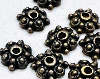 8mm bead cap (20) textured bronze color.