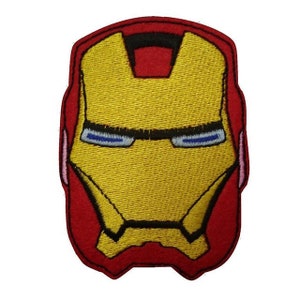 May include: Iron Man's face is embroidered on a red patch. The patch is yellow and has a black outline. The eyes are blue.