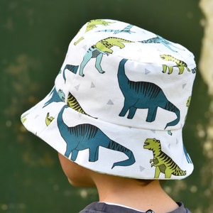 Reversible dinosaur bucket/sun hat