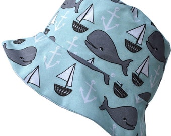 Handmade reversible bucket or sun hat, with whale design and aqua check print