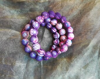 Pulsera vintage de cuentas de tela morada de los años 90: diseño étnico en espiral
