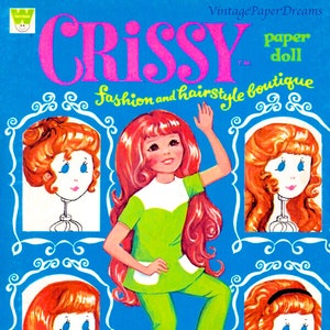 May include: A vintage Crissy paper doll book cover. The cover features a girl in a green outfit with red hair, surrounded by illustrations of different hairstyles. The title "CRISSY" is in large pink letters, with "Fashion and hairstyle boutique" below.