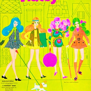 May include: A vintage "Fashion Flatsy" paper doll book cover. The cover features four illustrated paper dolls in colorful outfits, walking on a sidewalk. The background is a lime green color with the title in bright pink letters.