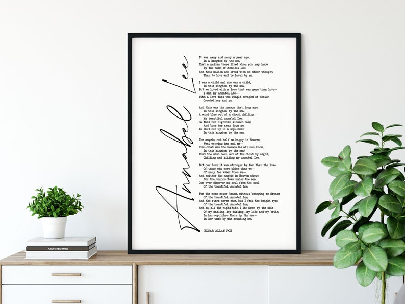 May include: Black and white printable wall art featuring a poem by Edgar Allan Poe titled "Annabel Lee". The poem is printed in a classic font and the title is written in a cursive script.
