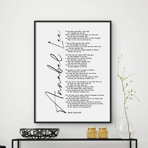 May include: A black and white printable wall art print featuring the poem "Annabel Lee" by Edgar Allan Poe. The poem is printed in a typewriter font and the title "Annabel Lee" is written in cursive.