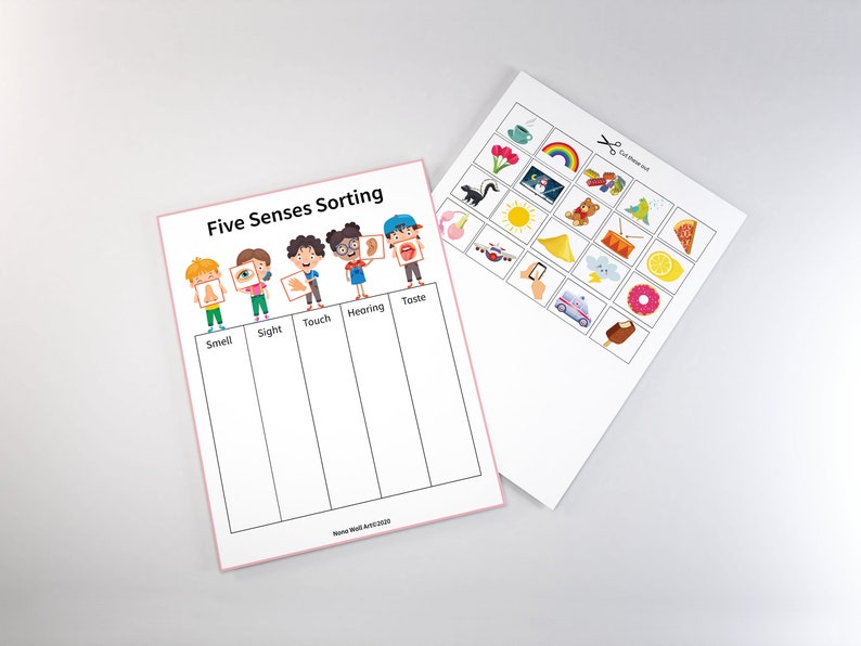 May include: Five Senses Sorting activity with colorful illustrations of children holding cards with images of a nose, eye, hand, ear, and mouth.  The activity includes 18 picture cards with images of objects that can be sorted by the five senses.