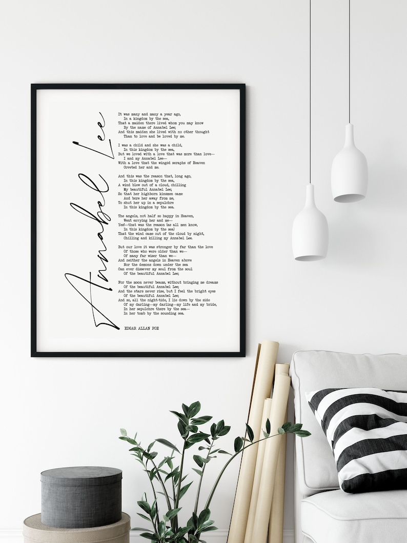 May include: Black and white printable wall art featuring a poem by Edgar Allan Poe titled "Annabel Lee". The poem is printed in a typewriter font and is framed in a black frame.