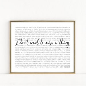 May include: A gold-framed print with a white background and black text. The text reads "I don't want to miss a thing."  The text is a quote from the song "I Don't Want to Miss a Thing" by Aerosmith. The print also includes the names "Kate & Luca" and the date "08.20.2016".