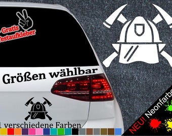 May include: A white car with a black and white firefighter helmet sticker on the back window. The sticker says "6 Größen wählbar" and "21 verschiedene Farben". There is also a sticker with a peace sign and the text "+ Gratis Testaufkleber".