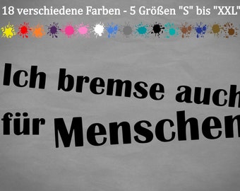 Könnte beinhalten: Grauer Hintergrund mit dem deutschen Text "Ich bremse auch für Menschen" in Schwarz. Über dem Text befinden sich 18 farbige Farbspritzer und der Text "18 verschiedene Farben - 5 Größen 'S' bis 'XXL'."