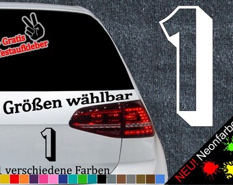 May include: A white car with a black and white number one sticker on the back window. The sticker says "6 Größen wählbar" and "21 verschiedene Farben". There are also stickers on the back window that say "+ Gratis Testaufkleber" and "NEU! Neonfarben".