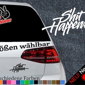 May include: A white car with a black and white "Shit Happens" sticker on the back window. The sticker is available in 6 sizes and 21 colors, including neon colors. The car also has a red "+ Gratis Testaufkleber" sticker on the back window.