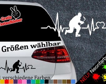 May include: A black and white sticker of a hockey player with a heartbeat graphic. The sticker says "6 Größen wählbar" and "21 verschiedene Farben".