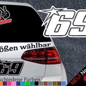 Op de afbeelding: Een witte auto met een zwart-witte sticker met nummer 69 op de achterruit. De sticker heeft een ster boven het nummer. De tekst "6 Größen wählbar" en "21 verschiedene Farben" staat ook op de auto.