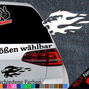 Peut inclure: Une tête de lion noire et blanche avec des flammes sortant de sa bouche. L'image montre une voiture avec le sticker sur la vitre arrière. Le texte "6 Größen wählbar" et "21 verschiedene Farben" est visible. Le texte "NEU! Neonfarben" est également visible avec un nuancier de couleurs néon.