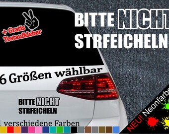 May include: A white car with a black and white sticker that says "Bitte Nicht Streicheln" (Please Don't Pet) in German. The sticker is on the back window of the car. The car has a red taillight and a black bumper. The sticker is available in 6 sizes and 21 colors. There is a free test sticker included.