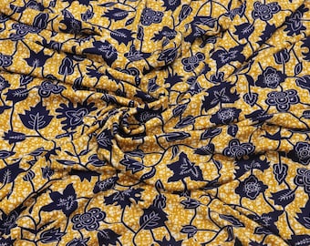 Yellow leaves soft  jersey african print inspired stretch fabric sold by the yard