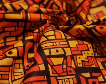 orange -brown African ankara wax printed fabric in 100% cotton sold by the yard