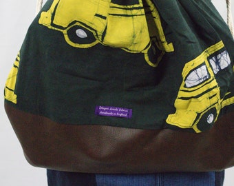 Black & Yellow faux leather batik adire fabric fully lined drawstring backpack